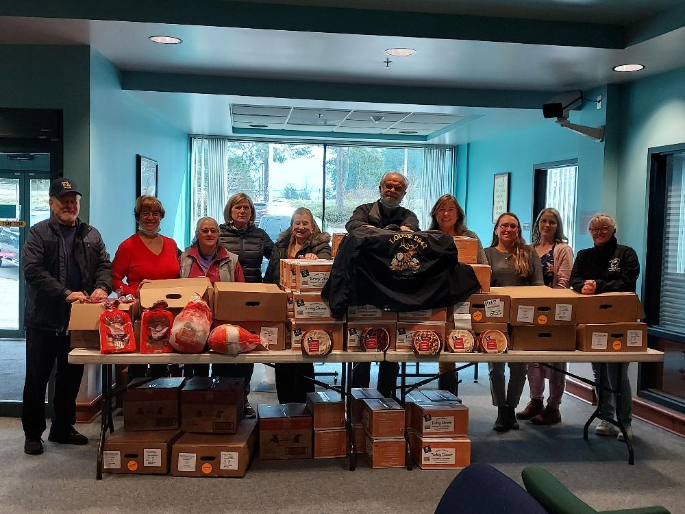 Sequim volunteer Elks deliver Thanksgiving meals, socks and toiletries to the Child Advocate Program for foster families to enjoy for Thanksgiving. The Elks were able to provide these meals and socks through a Beacon Grant received for $3500 from the Elks National Foundation and generous donations from Sequim Elks Lodge 2642.