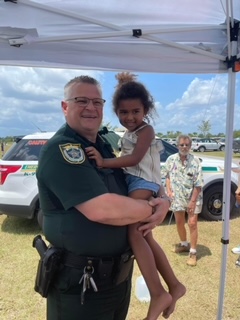 One of our youngest Elks, Sterling, gets to meet Sherriff Wayne Ivey. 