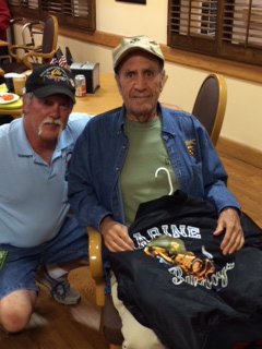 On May 30th, our Lodge barbequed for the St. James Veteran’s Home, where we cooked and served brats, pork steaks, and hot dogs to seventy veterans.  During our visit a special gift, a Marine flight jacket, was presented to veteran Joe Cawley from the Ellisville Elks Trustee, Mike St Onge.  In addition, we handed out "goodie bags" to all the Veterans, with socks, t-shirts, books and magazines.  All of this was made possible with the help of our Gratitude Grant and donations from our membership.