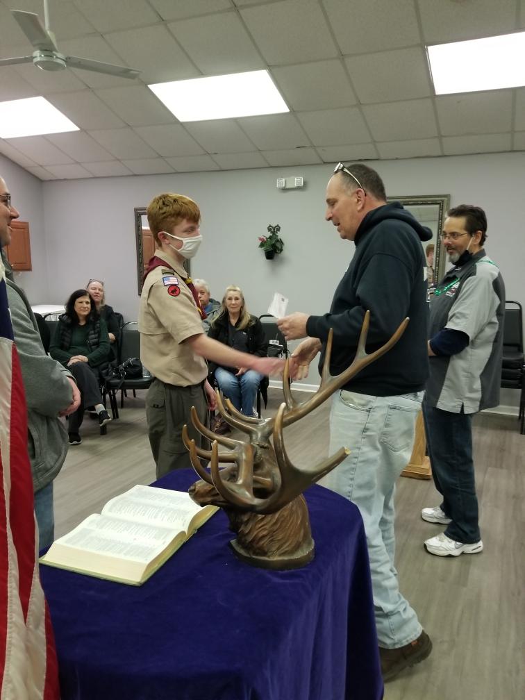 Joe LaMonica (right) and Frank Scotto (center) present Jacob Hybbeneth (center left) with donation for Eagle Scout project |  March 17, 2021