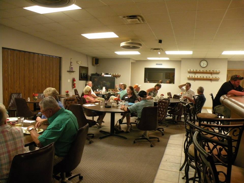 Our club room being treated to dinner after 2014 Shopping Spree.