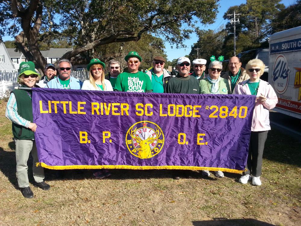 The Banner Brigade getting prepared for this year's St. Patrick's Day Parade. The parade begins a great day at the lodge, Corn Beef and Cabbage lunch followed by Irish music by "the Shamrocks by the Sea" in the evening.