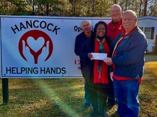 Dec donation to Hancock Helping Hands food bank