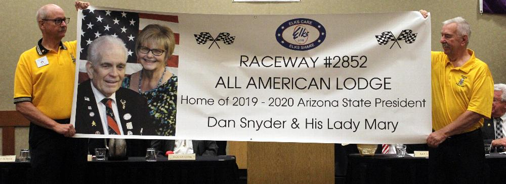 Don Schafer and Eddie Vance hold up our State President's Banner of President Dan Snyder and First Lady Mary. From Race way #2852